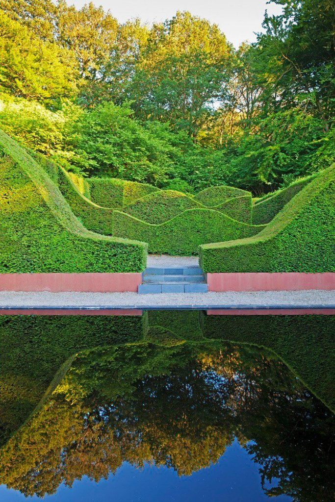 Reflecting pool created by Anne Wareham of Veddw House using Pond Black